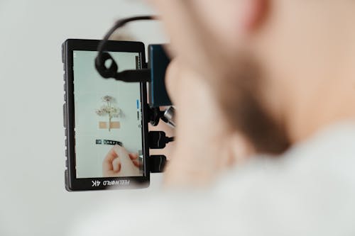 Person Holding Black Android Smartphone