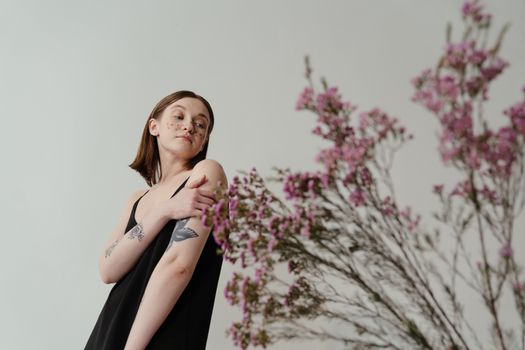 Woman in Black Sleeveless Dress