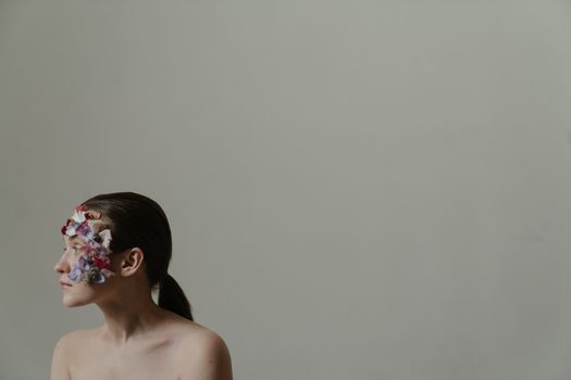 Woman With Brown Hair Wearing White and Pink Floral Headband