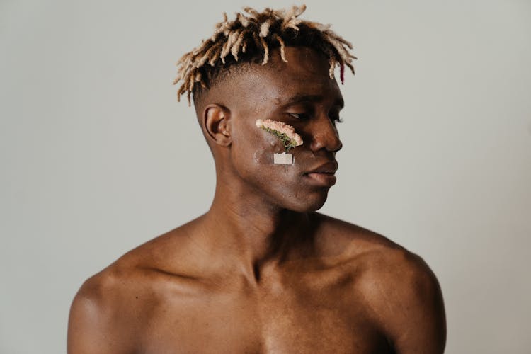 Topless Man With White Cream On His Face