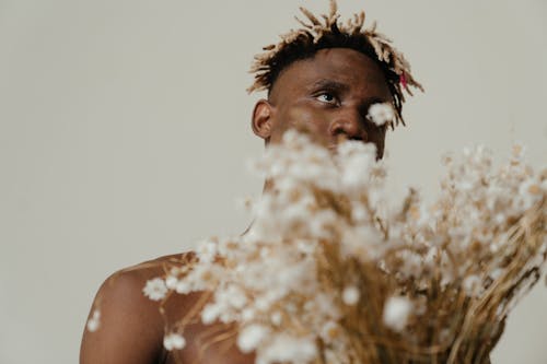 Man With White Powder on His Face