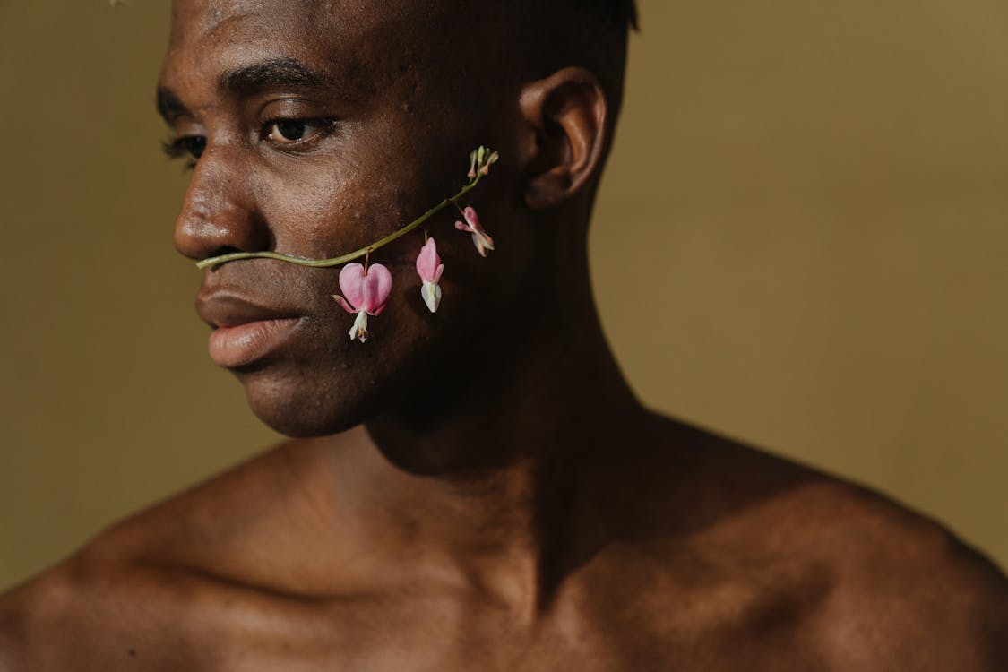 Free Woman With White Flower on Her Ear Stock Photo