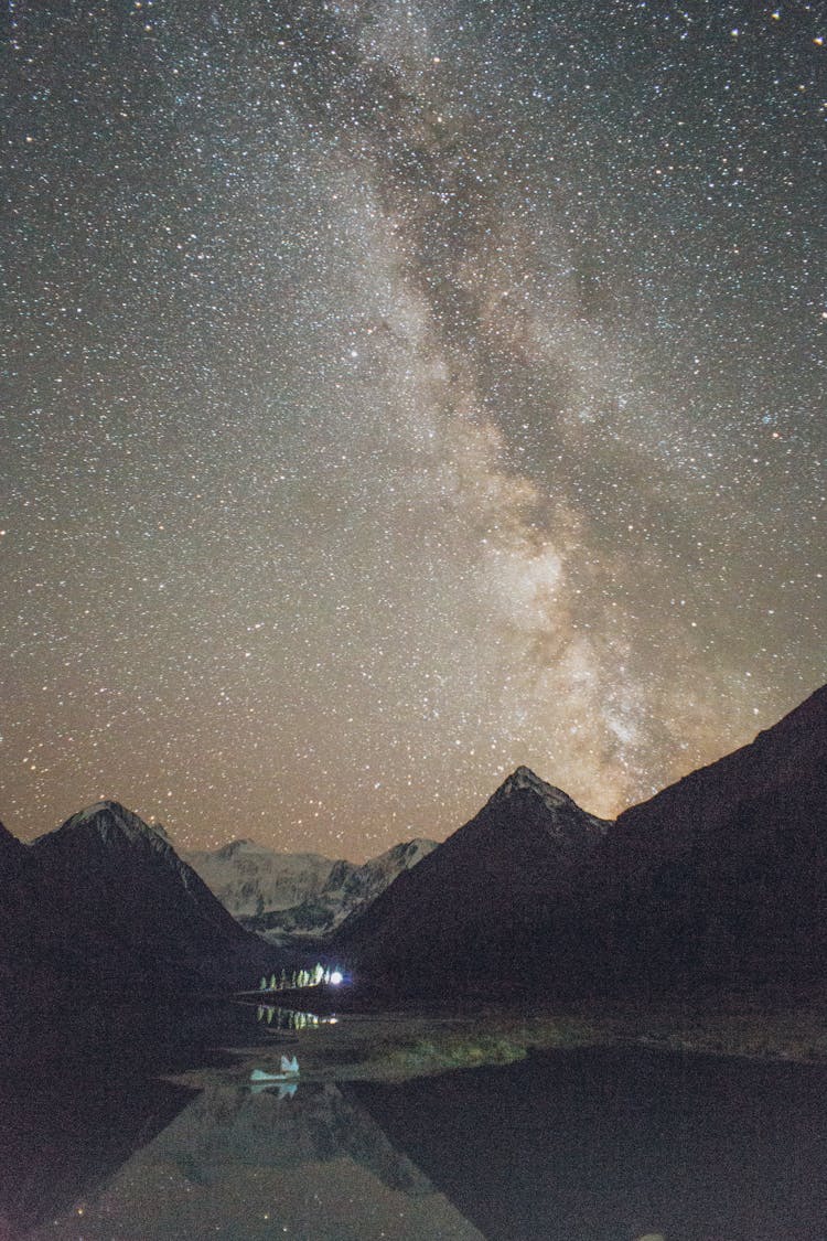 Silhouette Of Mountain Under Starry Night