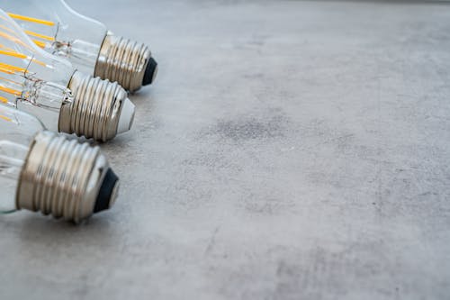 Free Photo of Lightbulbs on Gray Surface Stock Photo