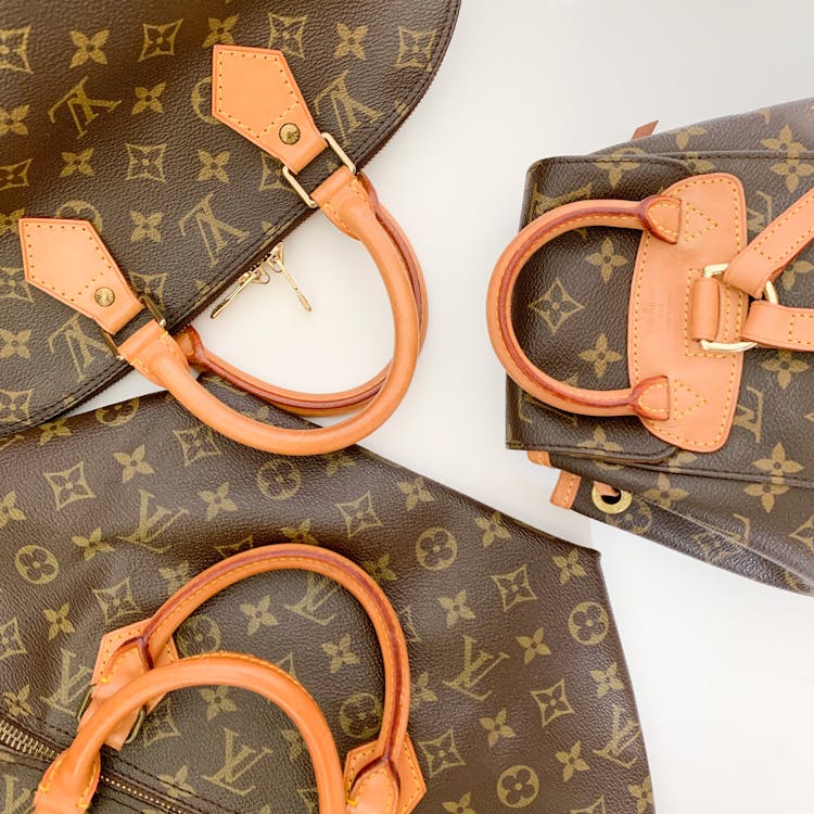Free Brown Louis Vuitton Monogram Leather Handbag Stock Photo social media