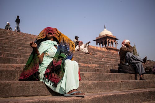 People Sitting on the Stairs