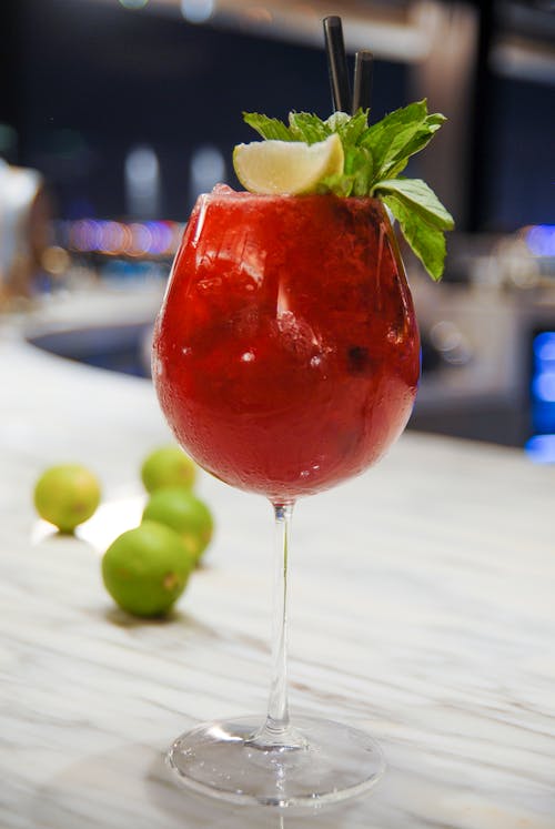 Red Drink in Clear Wine Glass