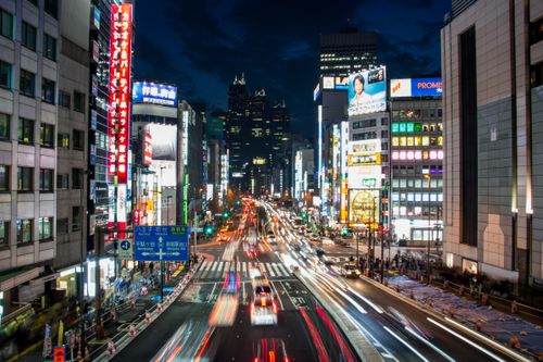 Free Explore the dynamic night cityscape of Shinjuku, Tokyo, showcasing bright lights and bustling streets. Stock Photo