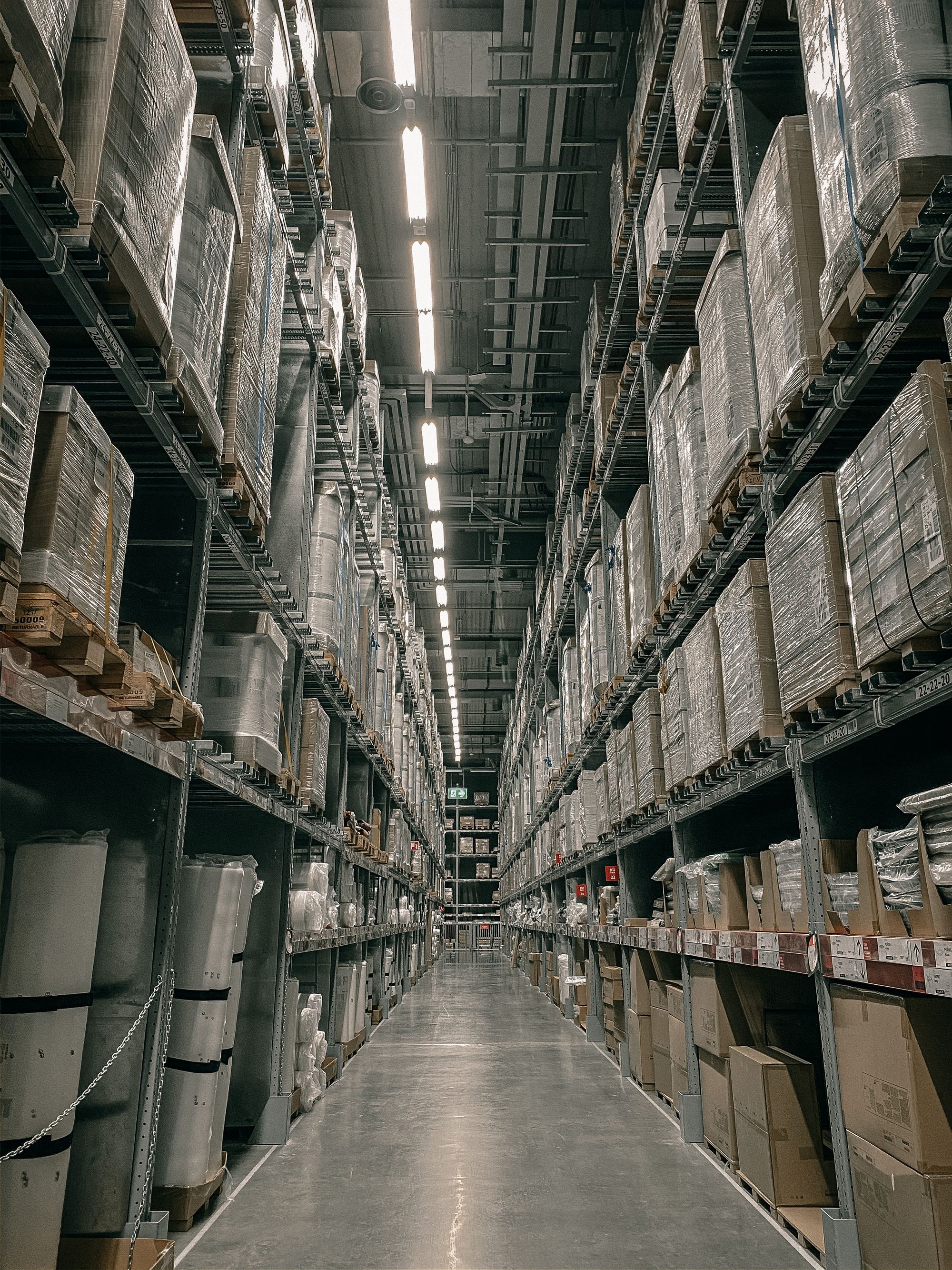 Warehouse racking of the kind used to hold finished premix stock