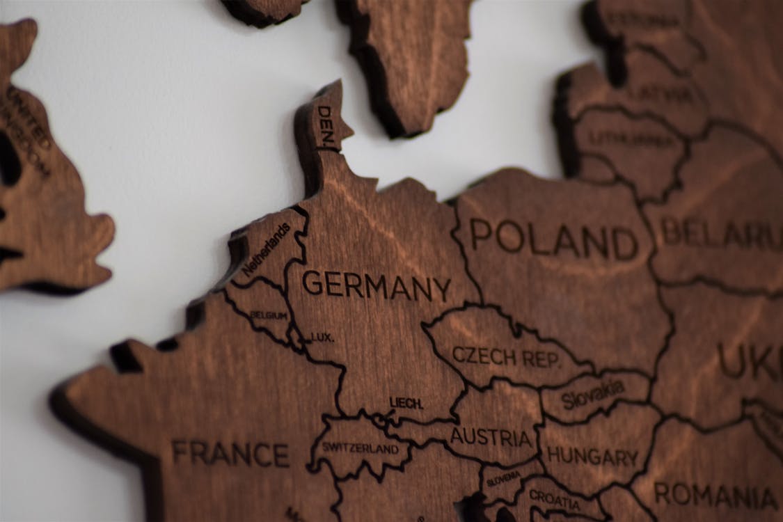Free Close-Up Photo of Wooden Jigsaw Map Stock Photo