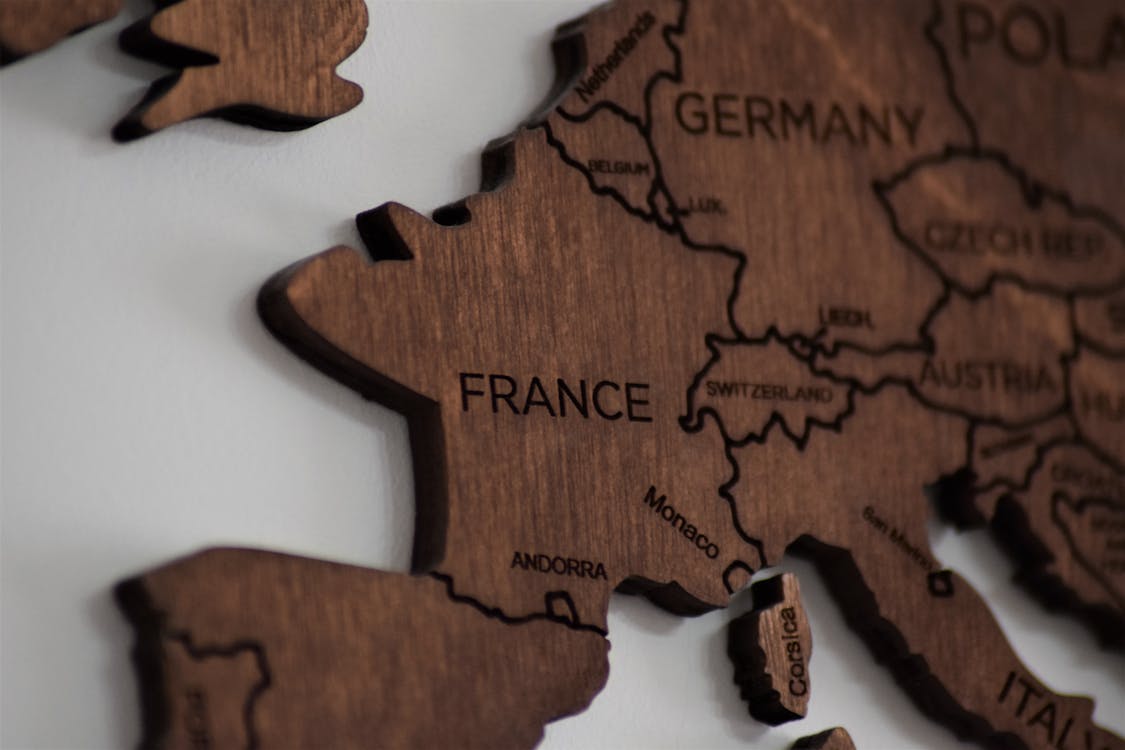 Free Close-Up Photo of Wooden Jigsaw Map Stock Photo