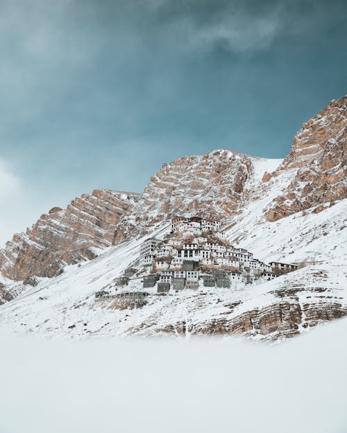 Monastery on Mountainside in Winter