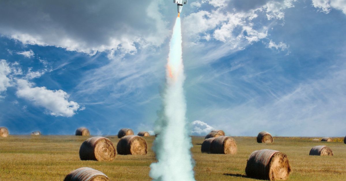 Field Rockets Launched model rocket in rural field · Free Stock Photo