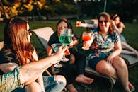 Photo of People Doing Cheers
