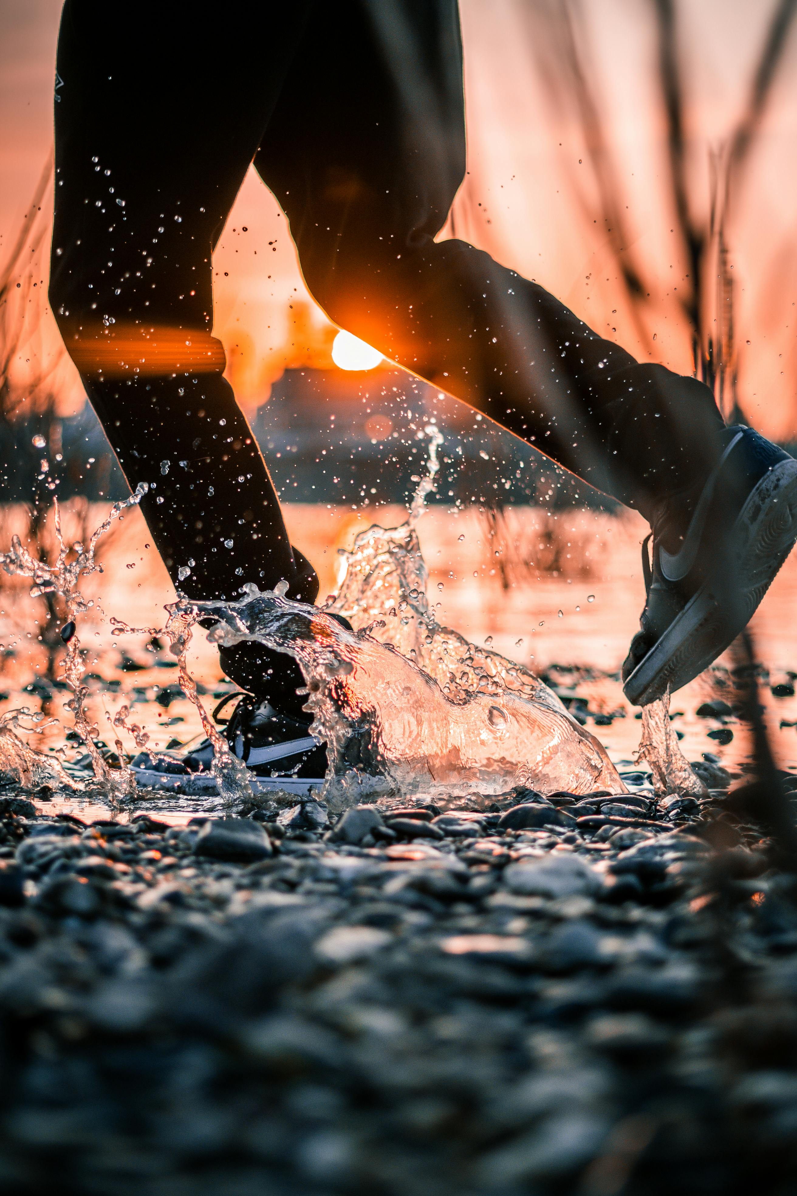 photo of person standing on water