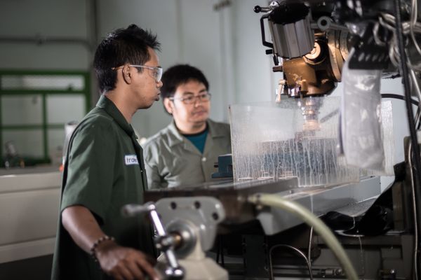DFM design comparison for CNC machining cost reduction