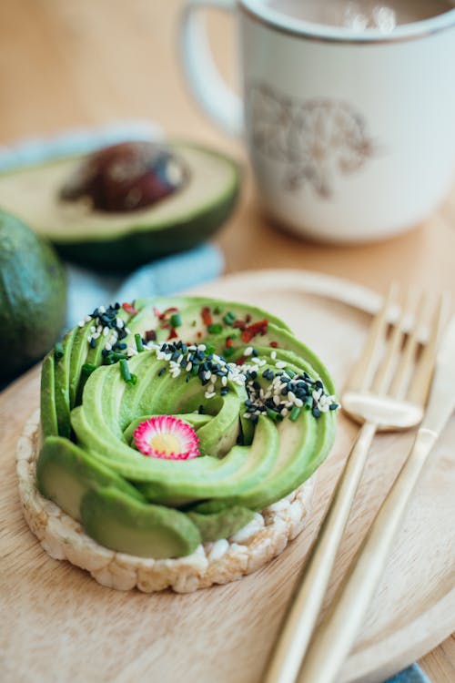 Green and Brown Cake on White Ceramic Plate