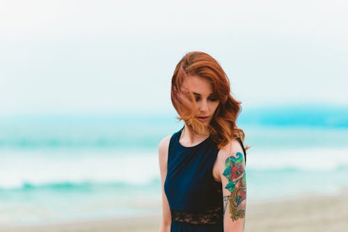 Woman Wearing Blue Tank Top