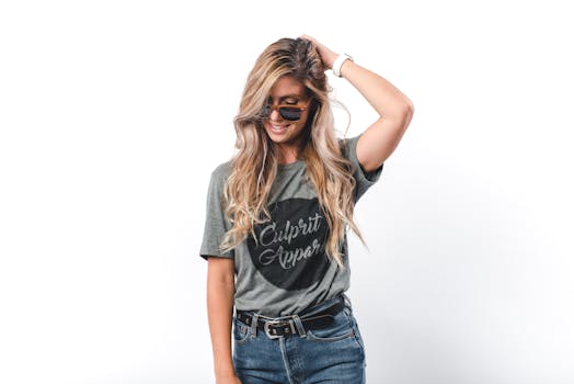 Woman Wearing Gray Shirt Holding Head