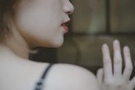 Selective Focus Photo of a Woman's Red Lips