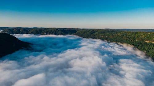 Valley covered with clouds from height