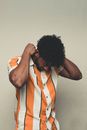 Modern black man wearing golden cross