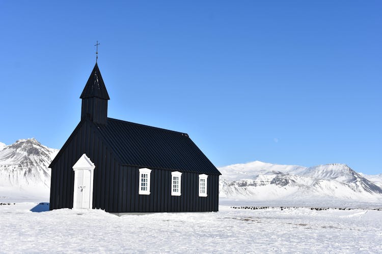 A Black Church In Snow