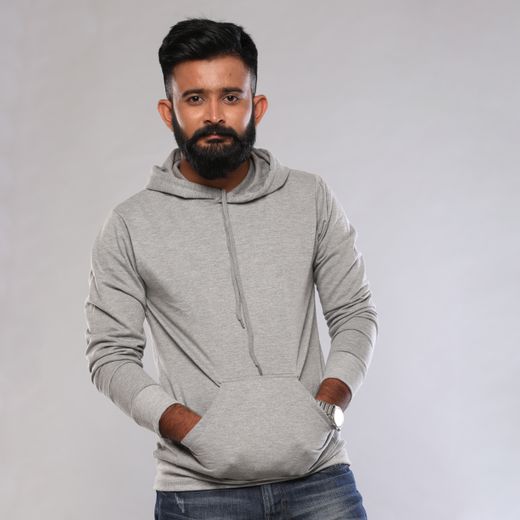 Grey sweatshirt paired with denim jeans men's casual look