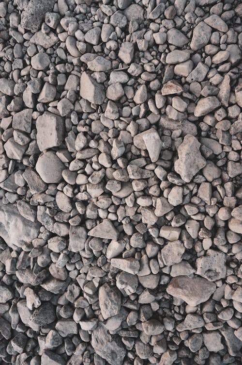 Abstract background of gray pebbles on ground