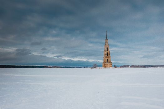 Neoclassical flooded belfry on snowy terrain