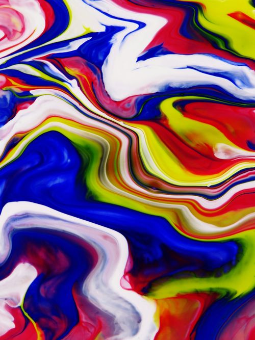 Free Vibrant acrylic paint swirl creates a modern abstract art piece, full of color and movement. Stock Photo