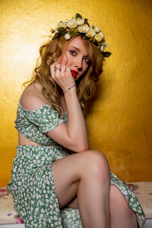 Beautiful Woman Wearing a Flower Crown Looking at the Camera