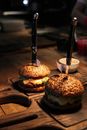 Burger With Patty and Lettuce on Brown Wooden Table