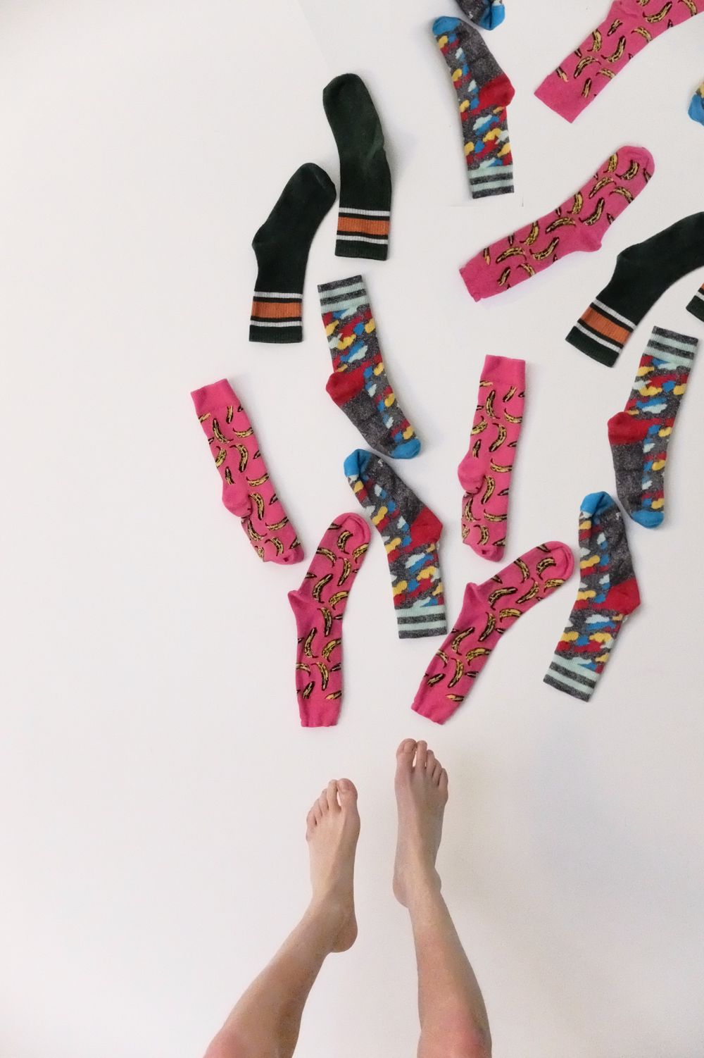 Modern bright socks lifestyle photography — SIPRAS Industries custom socks manufacturer