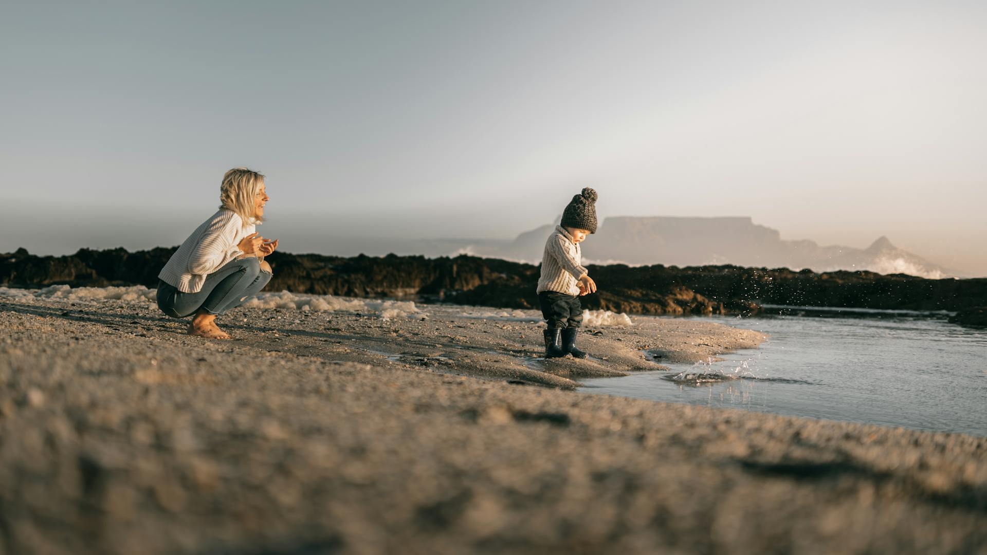 A Mother Spending Time with Her Child on the Beach