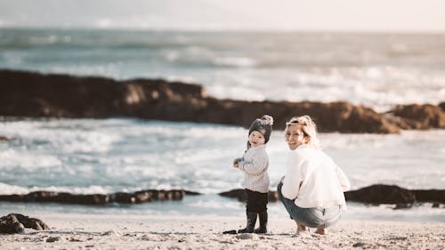 A Mother Spending Time with Her Child on the Beach