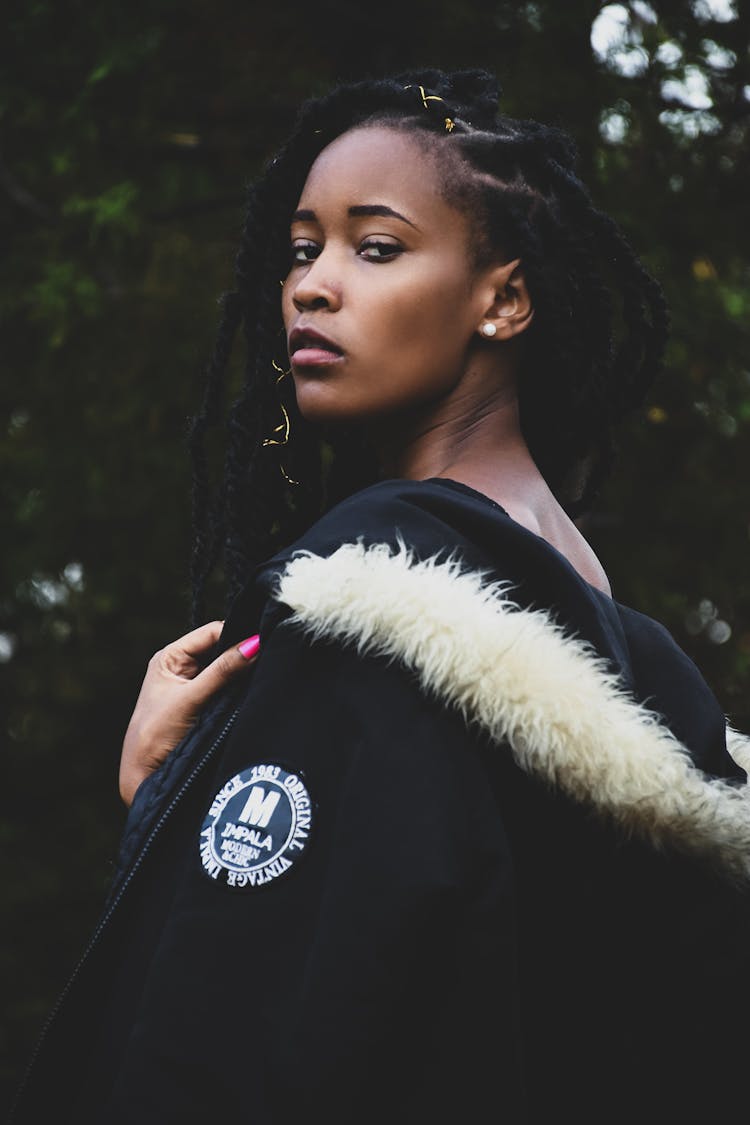 Trendy Arrogant Black Woman With Makeup Outdoors