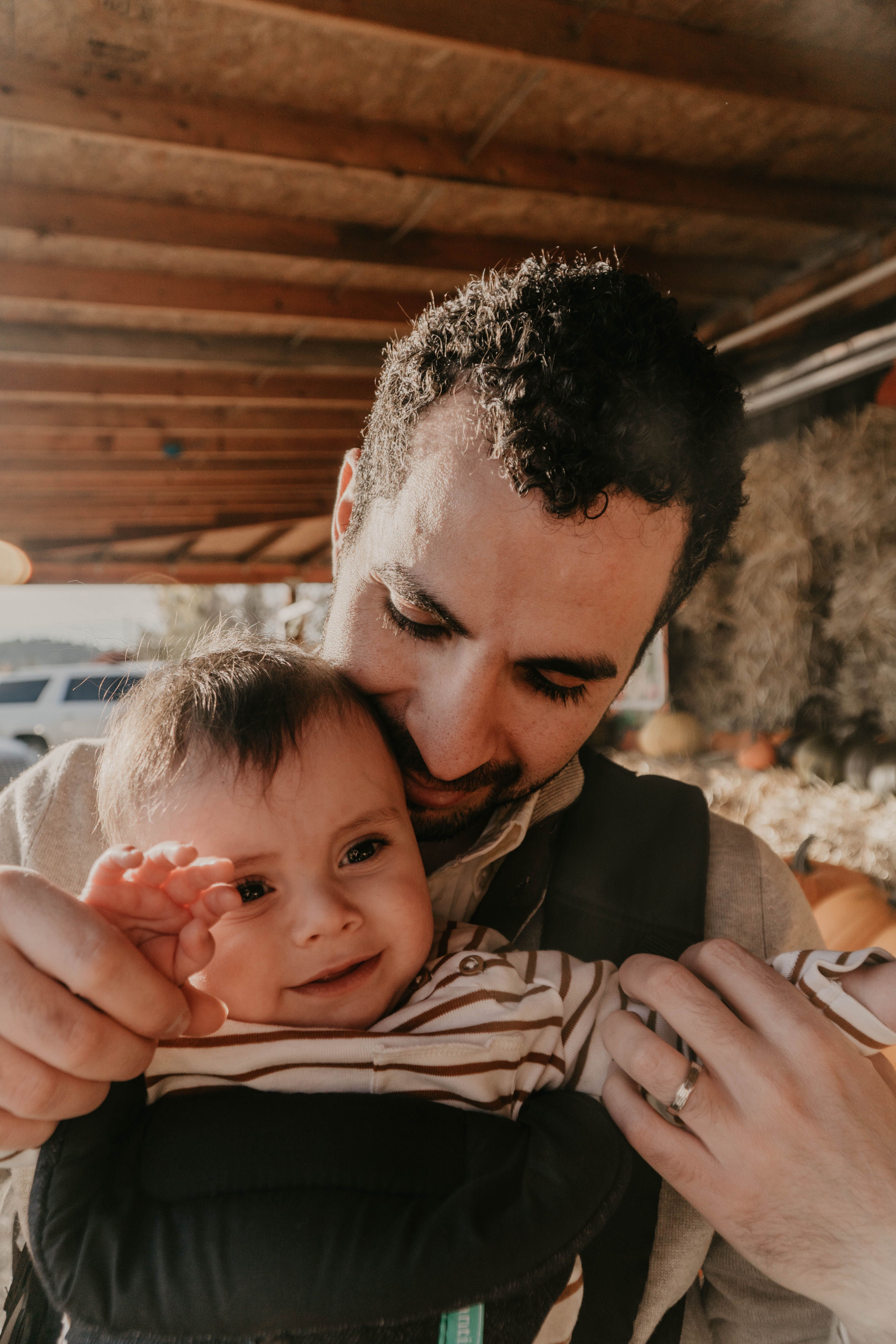 A Father Carrying His Kid on His Shoulders · Free Stock Photo