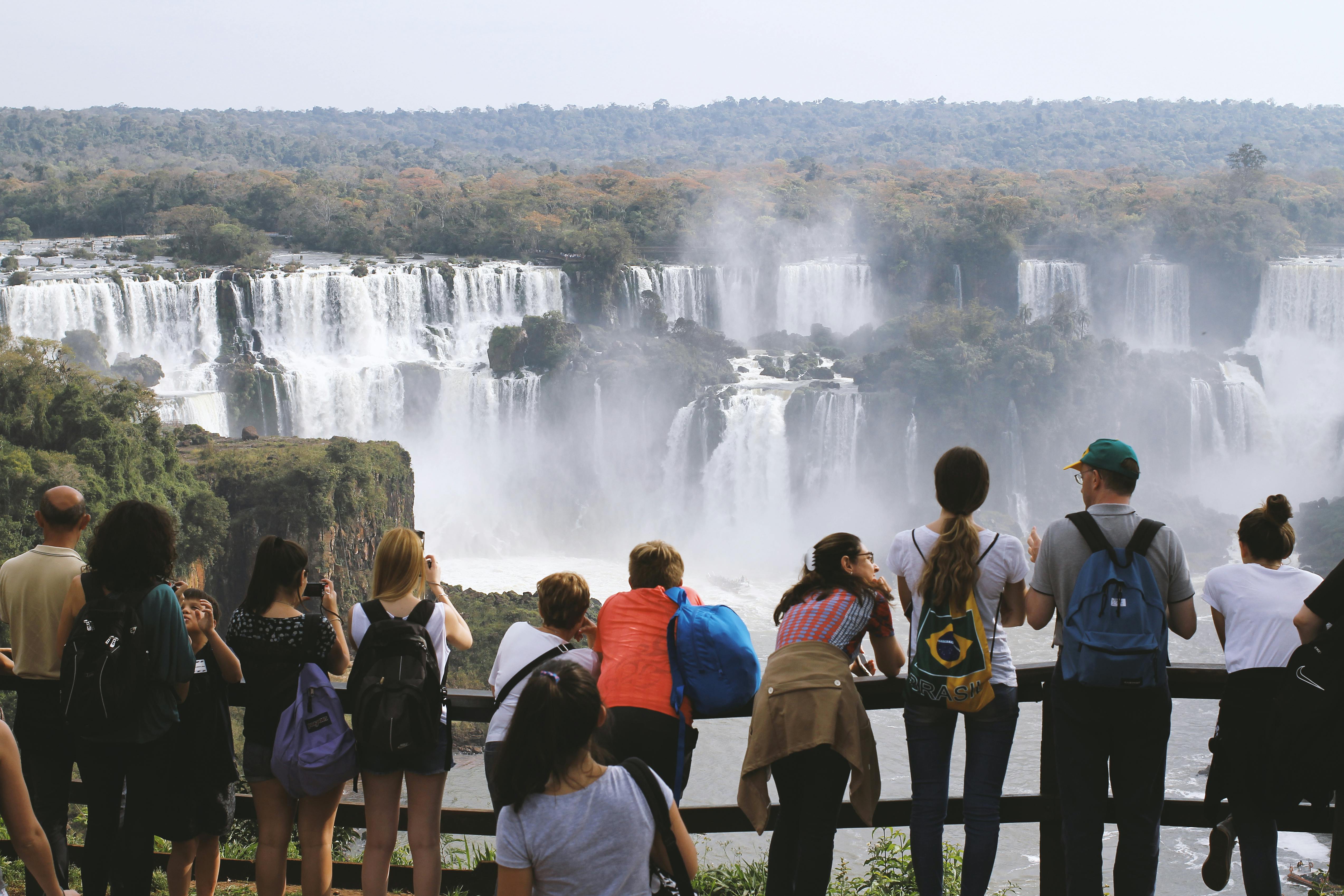 Free People Looking at Waterfalls Stock Photo