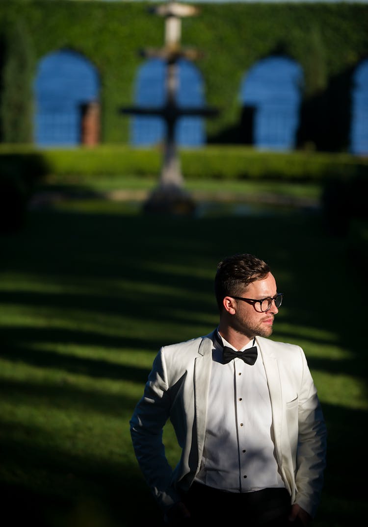 Elegant Man Resting In Garden