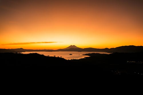 Ingyenes stockfotó amanecer, lago, paisaje témában