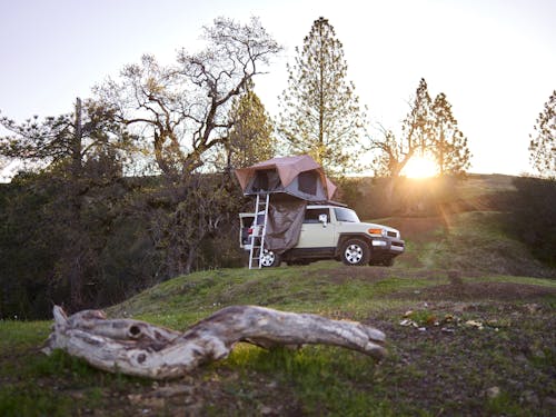 Free 
A Car with a Rooftop Tent Stock Photo
