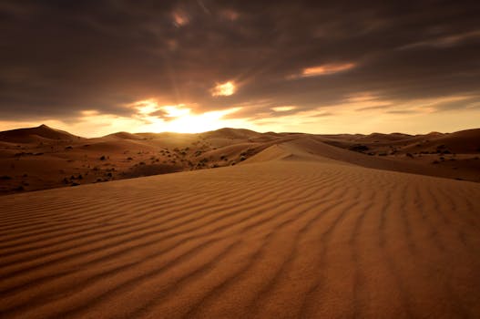 Breathtaking sunrise over the sand dunes in the Erg Chebbi desert, Morocco.