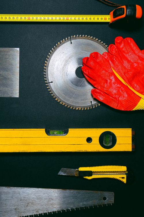 Red and Yellow Hand Tools on the Table · Free Stock Photo