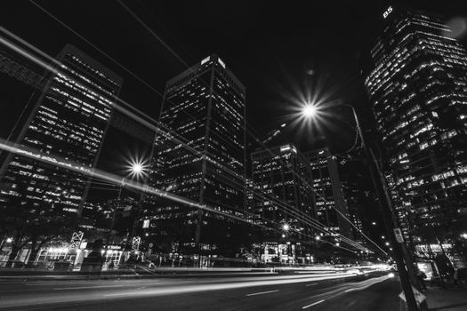 Grayscale Photo of City Buildings