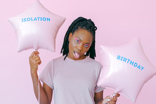 A playful and expressive birthday celebration with star-shaped balloons on a pink background.