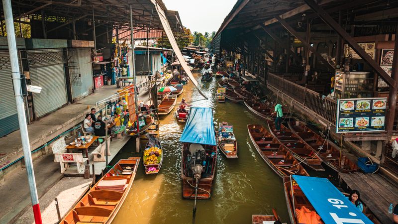 Boats and vendors at a Thai floating market