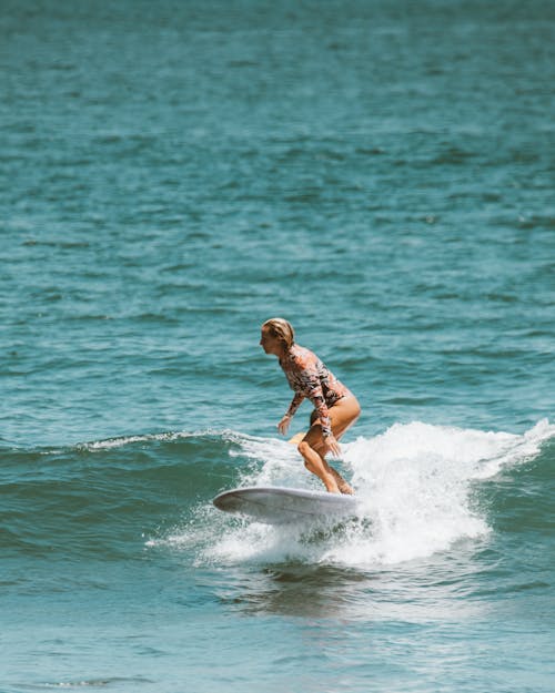 A Woman Surfing in the Ocean