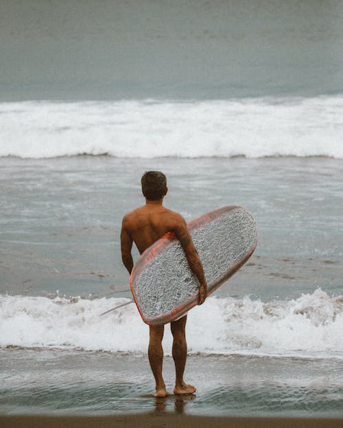 A Man Standing on the Shore