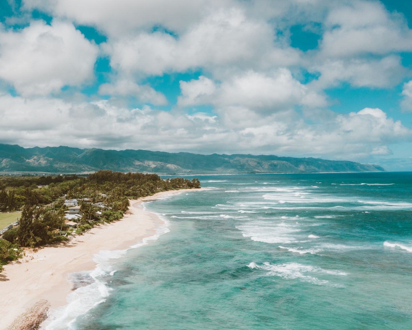 Oʻahu’s North Shore coastline and surf seen from above